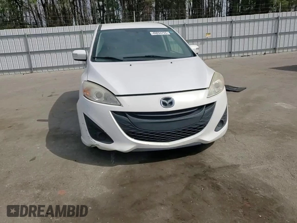 2015 Mazda 5 Sport z VIN JM1CW2BL1F0178961, wystawiony jako Copart lot #49853755 z przebiegiem 154 980 mil mil oraz Szkoda całkowita • Salvage title. Historia ofert i sprzedaży dostępna na DreamBid. Obrazek 11.