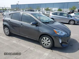 2016 Toyota Prius One z VIN JTDKDTB32G1134020, wystawiony jako IAAI lot #42136215 z przebiegiem 102 529 mil mil oraz . Historia ofert i sprzedaży dostępna na DreamBid. Obrazek 1.