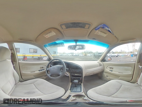 2003 Kia Spectra z VIN KNAFB121835211810, wystawiony jako Copart lot #51289625 z przebiegiem 133 868 mil mil oraz Szkoda całkowita • Salvage title. Historia ofert i sprzedaży dostępna na DreamBid. Obrazek 12.