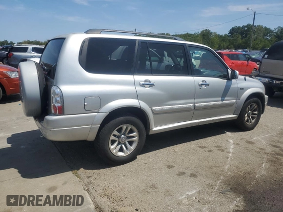 2004 Suzuki XL7 LX with VIN JS3TX92V644109794, listed as a Copart auction lot 68244184 with 107,769 mi miles and Salvage title. Bid and sale history available at DreamBid. Image 3.