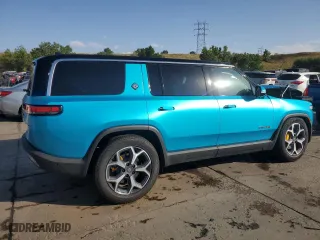 2023 Rivian R1S Adventure with VIN 7PDSGABA5PN027894, listed as a Copart auction lot 71442484 with 4,456 mi miles and Salvage Title. Bid and sale history available at carsss.com. Image 3.