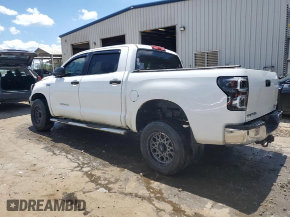 2012 Toyota Tundra 4WD Truck with VIN 5TFDW5F11CX242580, listed as a Copart auction lot 56193484 with 230,694 mi miles and Salvage Title. Bid and sale history available at carsss.com. Image 2.