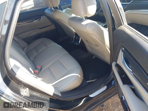 2014 Cadillac XTS Luxury with VIN 2G61M5S30E9229758, listed as a IAAI auction lot 42179952 with 125,848 mi miles and . Bid and sale history available at DreamBid. Image 8.