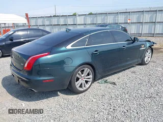 2014 Jaguar XJ Portfolio z VIN SAJWA2GZ4E8V60315, wystawiony jako IAAI lot #42293880 z przebiegiem 97 712 mil mil oraz . Historia ofert i sprzedaży dostępna na DreamBid. Obrazek 4.