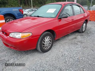 1997 Ford Escort LX z VIN 1FALP13P6VW375778, wystawiony jako IAAI lot #42787699 z przebiegiem 86 715 mil mil oraz . Historia ofert i sprzedaży dostępna na DreamBid. Obrazek 2.