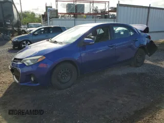 2014 Toyota Corolla L with VIN 5YFBURHE9EP040382, listed as a Copart auction lot 57497205 with 105,778 mi miles and Salvage title. Bid and sale history available at DreamBid. Image 1.