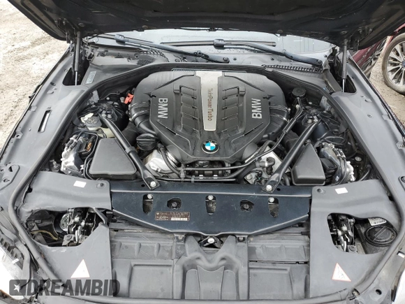 2014 BMW 6 Series 650i z VIN WBA6B2C5XED128959, wystawiony jako Copart lot #44201745 z przebiegiem 146 875 mil mil oraz Szkoda całkowita • Salvage title. Historia ofert i sprzedaży dostępna na DreamBid. Obrazek 11.