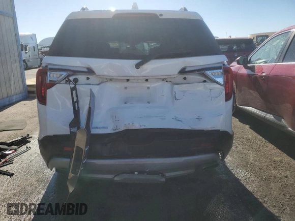 2023 GMC Acadia SLT with VIN 1GKKNML47PZ124812, listed as a Copart auction lot 42455465 with 87,116 mi miles and Salvage Title. Bid and sale history available at DreamBid. Image 6.