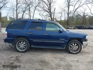 2001 Chevrolet Tahoe LT with VIN 1GNEC13T81R220256, listed as a IAAI auction lot 41800905 with 251,247 mi miles. Bid and sale history available at carsss.com. Image 13.