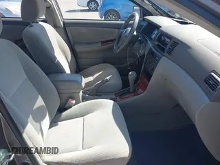2004 Toyota Corolla CE with VIN 1NXBR32E64Z303089, listed as a IAAI auction lot 42147550 with 232,062 mi miles. Bid and sale history available at carsss.com. Image 5.