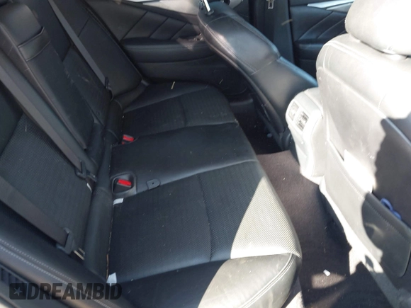 2014 Infiniti Q50 Hybrid Premium with VIN JN1AV7APXEM690577, listed as a IAAI auction lot 41493689 with 89,337 mi miles and . Bid and sale history available at DreamBid. Image 8.