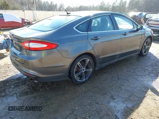 2015 Ford Fusion SE with VIN 1FA6P0HD2F5105136, listed as a IAAI auction lot 41688771 with 100,655 mi miles and . Bid and sale history available at DreamBid. Image 4.