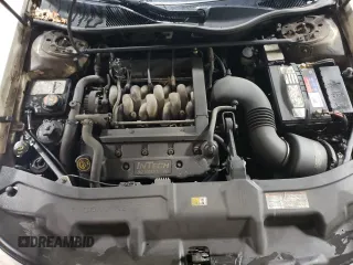 2000 Lincoln Continental with VIN 1LNHM97V2YY760288, listed as a Copart auction lot 80894624 with 115,785 mi miles and Salvage Title. Bid and sale history available at carsss.com. Image 11.