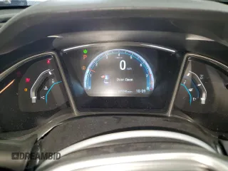 2018 Honda Civic EX с VIN 19XFC2F77JE040070, выставлен на аукционе Copart как лот 56895195 с пробегом 39 746 миль миль и Списание • Salvage title. История ставок и продаж доступна на DreamBid. Изображение 9.