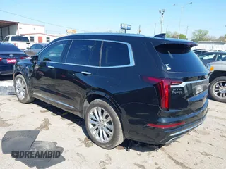 2020 Cadillac XT6 FWD Premium Luxury z VIN 1GYKPERS0LZ232338, wystawiony jako IAAI lot #41845562 z przebiegiem 86 839 mil mil oraz . Historia ofert i sprzedaży dostępna na DreamBid. Obrazek 3.