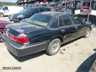 1998 Mercury Grand Marquis LS with VIN 2MEFM75W8WX680422, listed as a IAAI auction lot 41767379 with 1 mi miles. Bid and sale history available at carsss.com. Image 4.