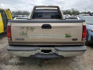 1999 Ford F-350 XL z VIN 1FTWW32F1XEA00890, wystawiony jako Copart lot #81316284 z przebiegiem 221 920 mil mil oraz Nie do naprawy • Non repairable. Historia ofert i sprzedaży dostępna na DreamBid. Obrazek 6.