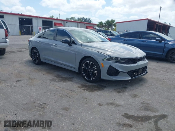 2023 Kia K5 GT-Line z VIN 5XXG64J25PG179696, wystawiony jako IAAI lot #42114587 z przebiegiem 49 192 mil mil oraz . Historia ofert i sprzedaży dostępna na DreamBid. Obrazek 1.