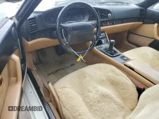 1995 Porsche 968 z VIN WP0CA296XSS840145, wystawiony jako Copart lot #68026874 z przebiegiem 105 017 mil mil oraz Szkody całkowita. Historia ofert i sprzedaży dostępna na DreamBid. Obrazek 8.
