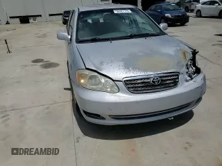 2006 Toyota Corolla CE z VIN 1NXBR32E06Z673649, wystawiony jako Copart lot #56927735 z przebiegiem 299 999 mil mil oraz Szkoda całkowita • Salvage title. Historia ofert i sprzedaży dostępna na DreamBid. Obrazek 13.