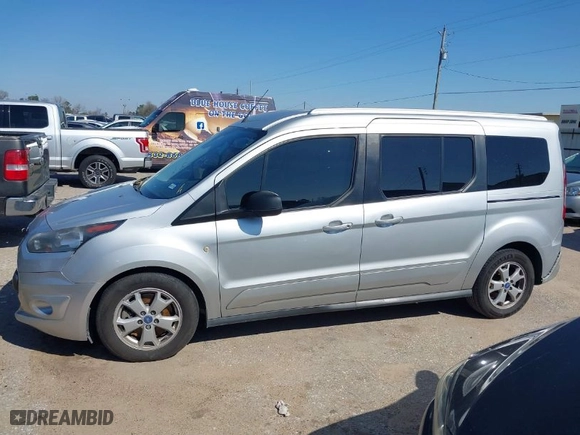 2015 Ford Transit Connect Wagon XLT with VIN NM0GE9F73F1176890, listed as a IAAI auction lot 41616697 with 128,674 mi miles. Bid and sale history available at carsss.com. Image 14.