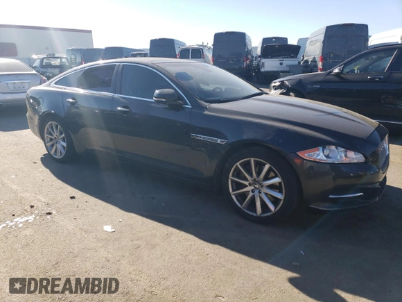 2012 Jaguar XJ with VIN SAJWA1CB7CLV33879, listed as a Copart auction lot 88708995 with Not provided miles and Salvage title. Bid and sale history available at DreamBid. Image 4.