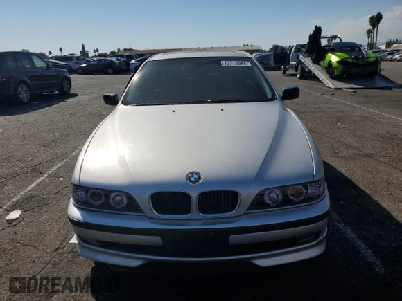 2000 BMW 5 Series 528iA with VIN WBADM6346YGU26119, listed as a Copart auction lot 73773084 with 177,616 mi miles and Salvage Title. Bid and sale history available at carsss.com. Image 5.