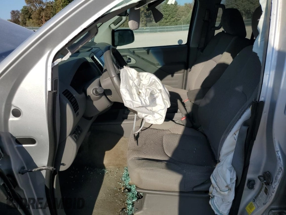2015 Nissan Frontier S with VIN 1N6AD0EV3FN705610, listed as a Copart auction lot 77530764 with 165,782 mi miles and Salvage title. Bid and sale history available at DreamBid. Image 7.