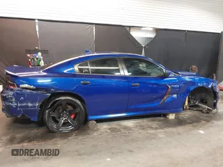 2022 Dodge Charger R/T with VIN 2C3CDXCT9NH127952, listed as a IAAI auction lot 42020401 with 55,483 mi miles and . Bid and sale history available at carsss.com. Image 14.