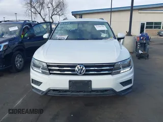 2019 Volkswagen Tiguan S with VIN 3VV1B7AX2KM039970, listed as a IAAI auction lot 41498706 with 56,907 mi miles and . Bid and sale history available at DreamBid. Image 12.