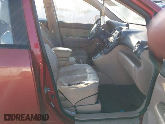 2008 Kia Rondo LX with VIN KNAFG526587147323, listed as a IAAI auction lot 41550909 with 150,967 mi miles. Bid and sale history available at carsss.com. Image 5.