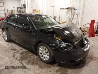 2014 Chrysler 200 LX with VIN 1C3CCBAG1EN158745, listed as a IAAI auction lot 40994879 with 180,000 mi miles. Bid and sale history available at carsss.com. Image 1.