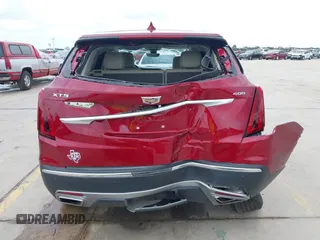 2020 Cadillac XT5 Premium Luxury FWD z VIN 1GYKNCRS8LZ228516, wystawiony jako IAAI lot #42409513 z przebiegiem 54 765 mil mil oraz . Historia ofert i sprzedaży dostępna na DreamBid. Obrazek 16.