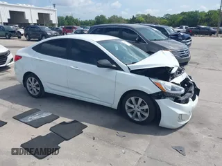 2014 Hyundai Accent GLS with VIN KMHCU4AE6EU766796, listed as a IAAI auction lot 41933743 with 99,142 mi miles. Bid and sale history available at carsss.com. Image 1.