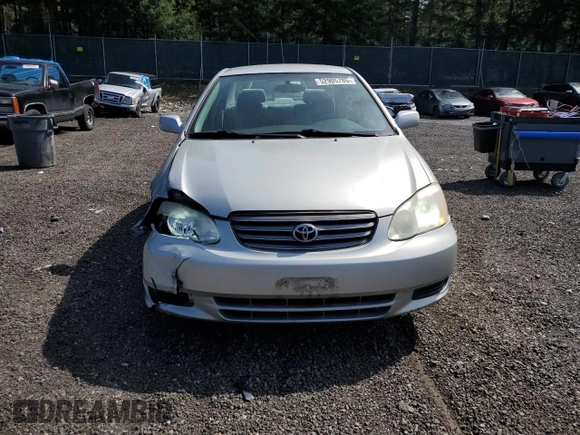 2003 Toyota Corolla CE with VIN 1NXBR32E43Z169570, listed as a Copart auction lot 52905785 with 175,487 mi miles and Salvage Title. Bid and sale history available at DreamBid. Image 5.