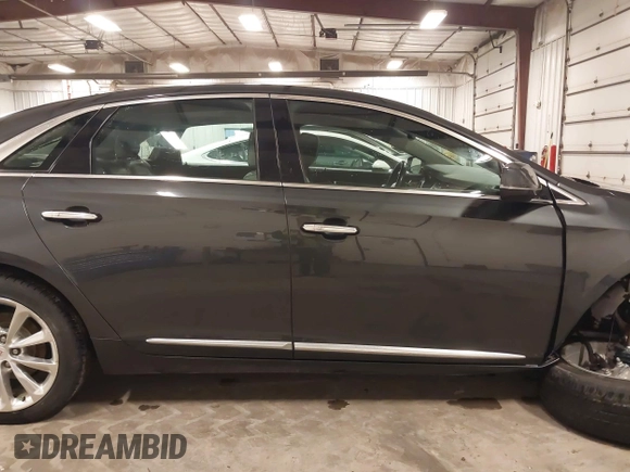 2013 Cadillac XTS Luxury with VIN 2G61R5S32D9101909, listed as a IAAI auction lot 41461611 with 110,603 mi miles. Bid and sale history available at carsss.com. Image 13.