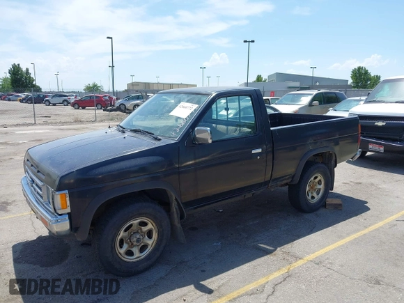 1991 Nissan Frontier XE with VIN 1N6SD11YXMC416937, listed as a IAAI auction lot 42660772 with 310,699 mi miles and . Bid and sale history available at DreamBid. Image 2.