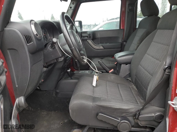 2012 Jeep Wrangler Unlimited Sport with VIN 1C4BJWDG1CL135894, listed as a Copart auction lot 52422245 with 143,670 mi miles and Salvage Title. Bid and sale history available at carsss.com. Image 7.