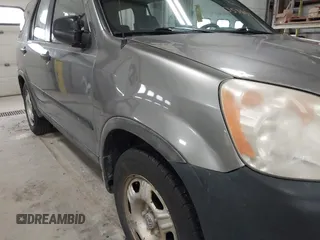 2006 Honda CR-V LX with VIN JHLRD785X6C053853, listed as a IAAI auction lot 42018895 with 246,316 mi miles and . Bid and sale history available at carsss.com. Image 12.