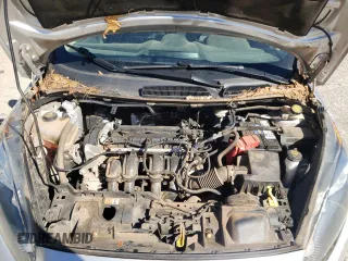 2018 Ford Fiesta S z VIN 3FADP4AJ0JM133583, wystawiony jako Copart lot #49156195 z przebiegiem 212 347 mil mil oraz Szkoda całkowita • Salvage title. Historia ofert i sprzedaży dostępna na DreamBid. Obrazek 11.