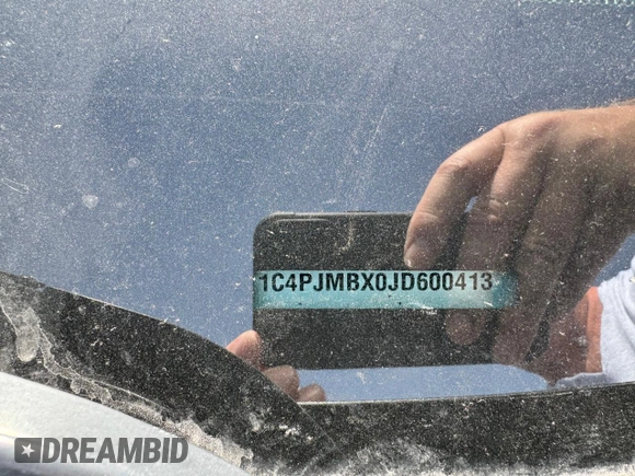 2018 Jeep Cherokee Trailhawk z VIN 1C4PJMBX0JD600413, wystawiony jako Copart lot #60336385 z przebiegiem 64 875 mil mil oraz Czysty tytuł • Clean title. Historia ofert i sprzedaży dostępna na DreamBid. Obrazek 10.