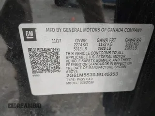2018 Cadillac XTS Luxury with VIN 2G61M5S30J9145353, listed as a IAAI auction lot 41859404 with 137,874 mi miles. Bid and sale history available at carsss.com. Image 9.
