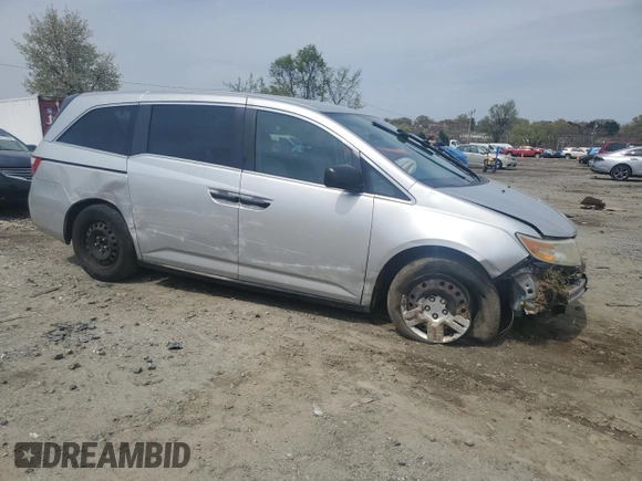 2013 Honda Odyssey LX z VIN 5FNRL5H28DB085114, wystawiony jako Copart lot #52942495 z przebiegiem 158 191 mil mil oraz Szkoda całkowita • Salvage title. Historia ofert i sprzedaży dostępna na DreamBid. Obrazek 4.