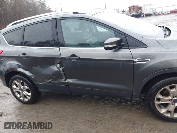 2015 Ford Escape Titanium with VIN 1FMCU9JX6FUB79093, listed as a IAAI auction lot 41805057 with 87,788 mi miles. Bid and sale history available at carsss.com. Image 13.