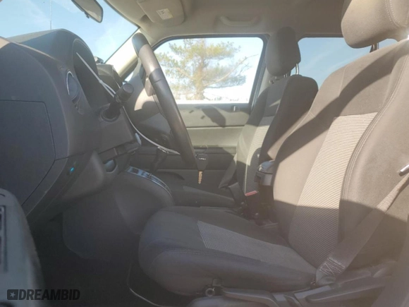 2014 Jeep Patriot Latitude with VIN 1C4NJRFB7ED630193, listed as a Copart auction lot 50415355 with 175,563 mi miles and Salvage Title. Bid and sale history available at carsss.com. Image 7.