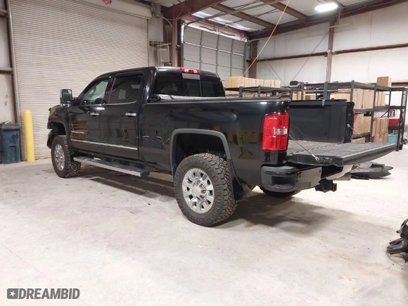 2015 GMC Sierra 2500HD available WiFi Denali with VIN 1GT120E89FF117773, listed as a IAAI auction lot 41587823 with 251,371 mi miles. Bid and sale history available at carsss.com. Image 3.