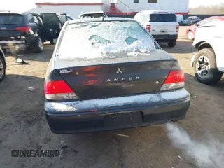 2002 Mitsubishi Lancer LS with VIN JA3AJ36E42U080614, listed as a IAAI auction lot 41397554 with 187,981 mi miles. Bid and sale history available at carsss.com. Image 16.