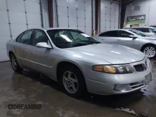 2003 Pontiac Bonneville SE with VIN 1G2HX52K734152756, listed as a IAAI auction lot 41482255 with 219,472 mi miles. Bid and sale history available at carsss.com. Image 1.