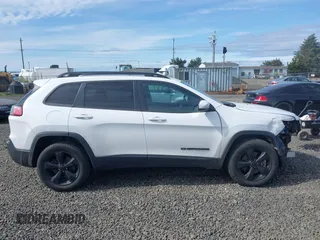 2019 Jeep Cherokee Latitude Plus with VIN 1C4PJMLX2KD432659, listed as a IAAI auction lot 42011291 with 76,015 mi miles. Bid and sale history available at carsss.com. Image 14.