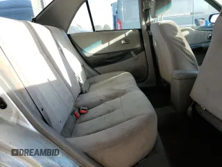 2002 Mazda Protege DX with VIN JM1BJ225120605237, listed as a Copart auction lot 49331225 with 184,556 mi miles and Salvage Title. Bid and sale history available at DreamBid. Image 10.